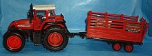 Traktor s vlečkou na setrvačník červený