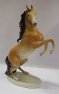 Kůň grošák ve skoku socha luxor pastel z porcelanu 39